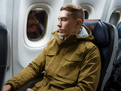 Which lightweight travel jacket keeps you warm, crease-free and camera-ready for long-haul flights